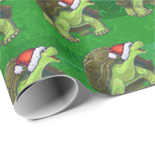 Papier Cadeau Tortue dans le casquette de Père Noël sur le ver