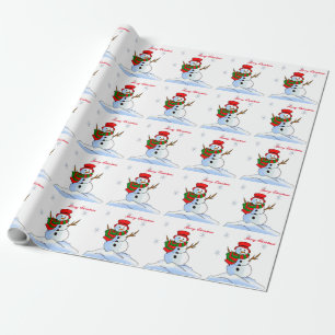 Papier Cadeau Un bonhomme de neige sur la neige et les flocons d