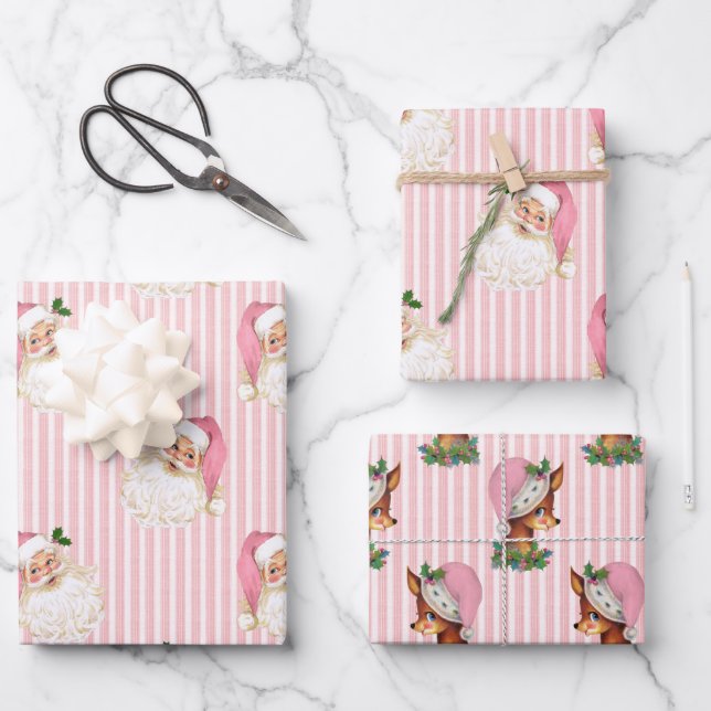 Papier d'enveloppement rose Père Noël et rennes vi (Recto)