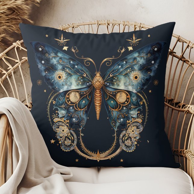 Papier Lune - Coussin de Witchmas Céleste (Lunar Moth - Celestial Witchmas Throw Pillow in a boho rattan armchair.)