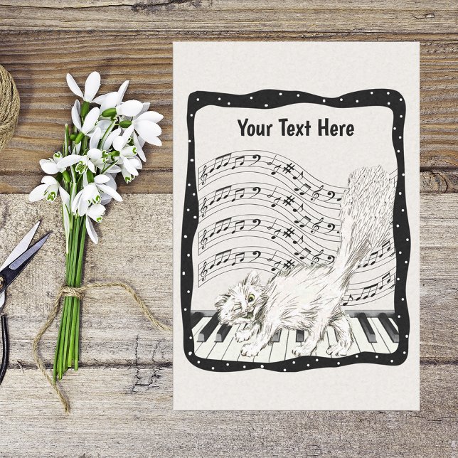 Papier Mousseline Chat blanc en train de danser sur cadre noir de pi (Smiling white cat on piano keys in black frame bars of music notes on black and white tissue paper.)