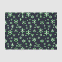 Flocons de neige verts et blancs avec fond bleu