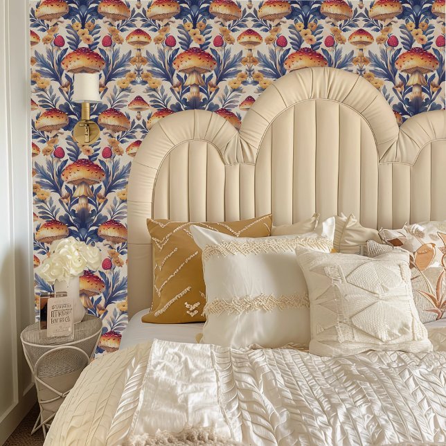 Papier Peint Fées au cœur Champignons Orange et Crème (Fairycore Orange and Cream Toadstools Wallpaper behind a cream colored headboard.)