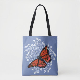 Papillon de monarque sur le sac fourre-tout à