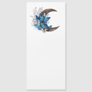 Papillons bleus sur croissant en bois