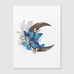 Papillons bleus sur croissant en bois