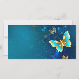 Papillons d'or sur un Arrière - plan bleu
