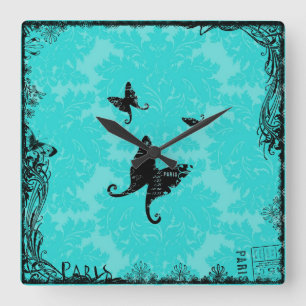 Papillons et horloge murale de Paris