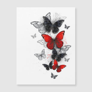 Papillons noirs et rouges volants