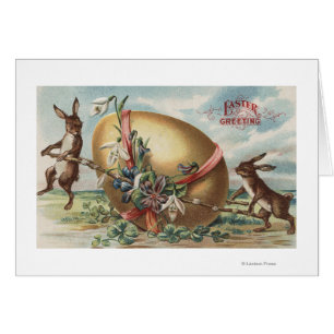 Pâques GreetingsRabbits par un oeuf décoré