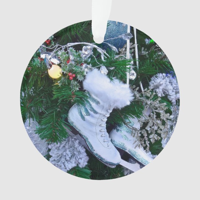 Parties scintillant bleue et patins à glace sur sa (devant)