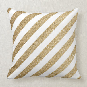 Parties scintillantes d'or et coussin de