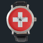Patriotique, montre spéciale avec Drapeau de Suiss<br><div class="desc">Restez ponctuel et élégant avec notre montre à main exclusive avec le drapeau de la Suisse! Ce garde-temps sophistiqué est minutieusement conçu pour intégrer l'élégance intemporelle du drapeau suisse. Le visage de la montre présente avec élégance la croix blanche distinctive centrée sur un arrière - plan rouge, symbolisant la riche...</div>