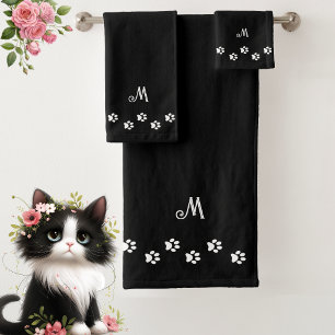 Patte de compagnie & monogramme sur fond noir