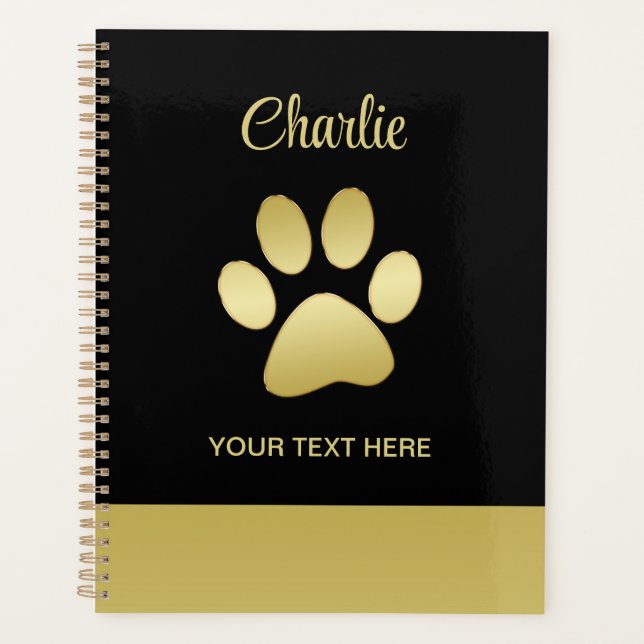 Paw chien brillant or sur arrière - plan noir (Devant)