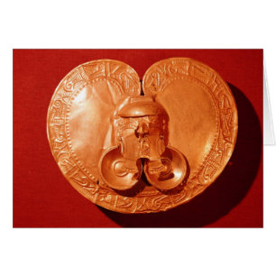 Pectoral avec un visage humain
