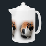 Pénitence de la théière de chat de Calico<br><div class="desc">Le chat calico a planifié son prochain déménagement. Un design exquis pour les fans de chat.</div>
