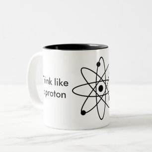 Pensez comme un proton et restez positif ! Tasse