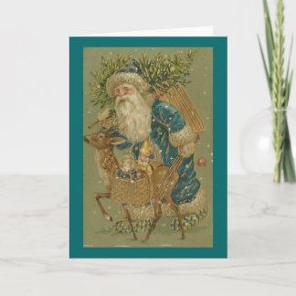 Père Noël dans le bleu avec la carte de Noël de