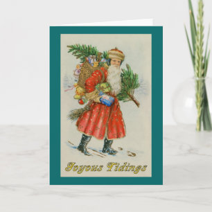Père Noël démodé avec la carte de Noël de paquet