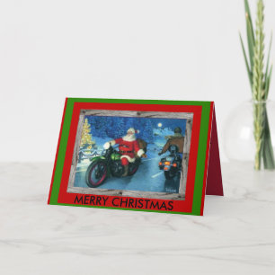Père Noël sur une carte de Noël de moto