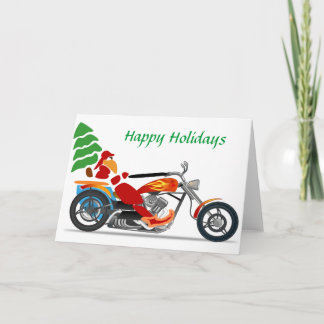 Père Noël sur une carte de Noël de moto