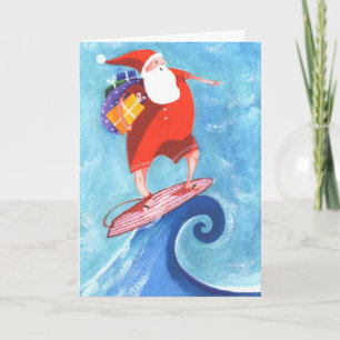 Père Noël surfant la carte de Noël