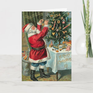 Père Noël vintage équilibrant la carte de Noël