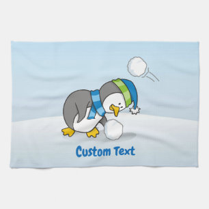 Petit manchot pour obtenir une serviette de cuisin