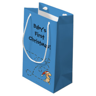 Petit Sac Cadeau Bébé courant le matin de Noël