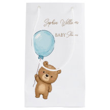 Mignon ours en peluche avec garçon à ballon bleu p