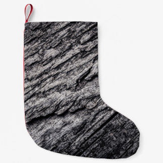 Petite Chaussette De Noël Ancien arrière - plan en bois texturé surface. Ton