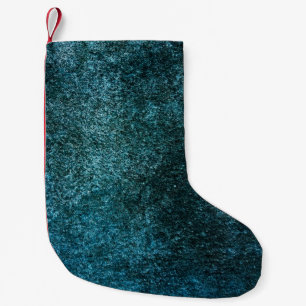 Petite Chaussette De Noël Arrière - plan bleu foncé qui est une surface rugu