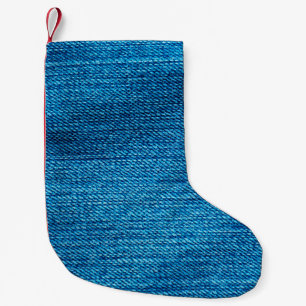Petite Chaussette De Noël arrière - plan denim bleu utilisé comme toile de f