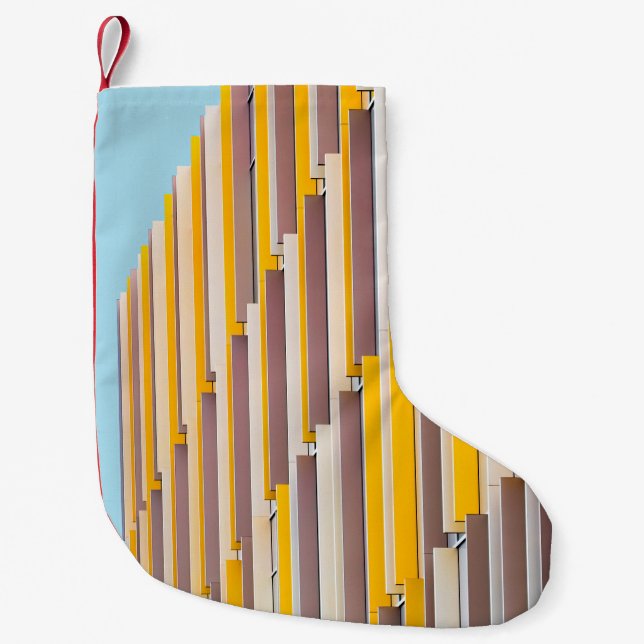 PETITE CHAUSSETTE DE NOËL BÂTIMENT EN BÉTON JAUNE EN JOURNÉE (Devant)