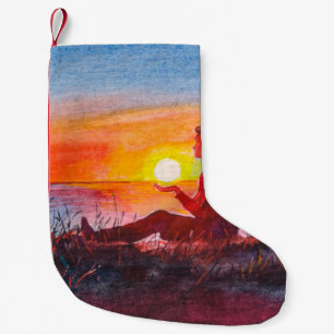 Petite Chaussette De Noël Beau coucher de soleil sur l'océan. Portrait de la