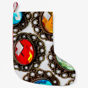 Petite Chaussette De Noël Broches vintages multicolores sur fond blanc