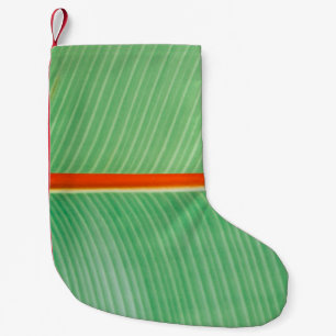 Petite Chaussette De Noël Closeup photo de la feuille verte