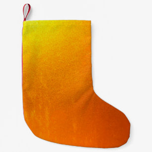 Petite Chaussette De Noël Couleur or ou feuille sur le mur texture arrière -