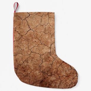 Petite Chaussette De Noël Désert de fissures d'érosion fissurées