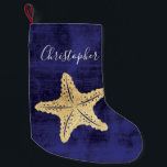 Petite Chaussette De Noël Elégant Blue Gold Beach Sea Star Monogramme<br><div class="desc">Elégante étoile de mer de couleur or ou étoile de mer avec nom monogrammé. Arrière - plan bleu. Parfait pour le thème de la plage chalet ou Noël nautique.</div>