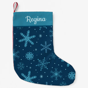 Petite Chaussette De Noël Flocons de neige de Noël classiques sur fond bleu