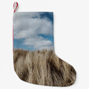 Petite Chaussette De Noël Grandes herbes sous les nuages cumulus