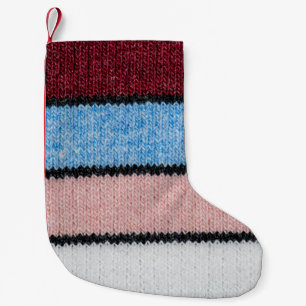 Petite Chaussette De Noël Laine à rayures multicolores : Texture de tissu.