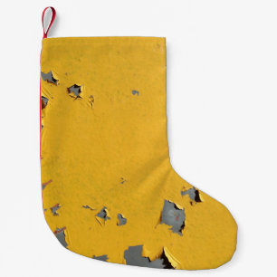 Petite Chaussette De Noël Métal jaune fissuré : texture sale.