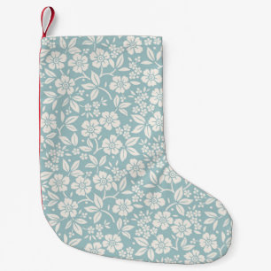 Petite Chaussette De Noël Modèle floral. Jolies fleurs sur fond bleu gris