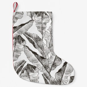 Petite Chaussette De Noël Motif de jungle tropicale plante sans couture. Pri