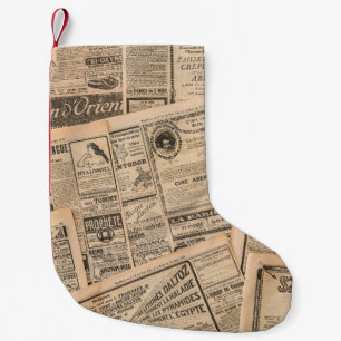 Petite Chaussette De Noël Newspaper pages with antique advertising. Vintage