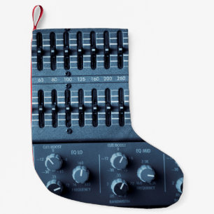 Petite Chaussette De Noël Nombreux boutons sur un mixeur de sons dans un stu
