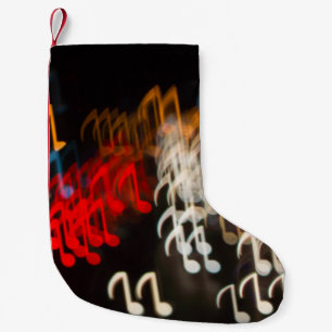 Petite Chaussette De Noël notes musicales Abstraites : lumières bokeh arrièr